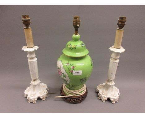 20th Century Chinese style porcelain baluster form table lamp together with a pair of white glazed porcelain table lamps 