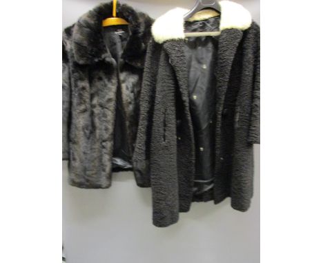 Ladies three quarter length black fur coat, three quarter length mink collared black woollen coat, five various fur berets an