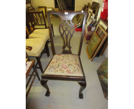 Set of four early 20th Century Chippendale style dining chairs raised on cabriole claw and ball supports 