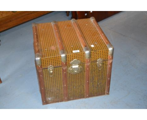 20th Century tin covered wooden bound trunk with hinged cover and side carrying handles, 18ins square x 15ins high 