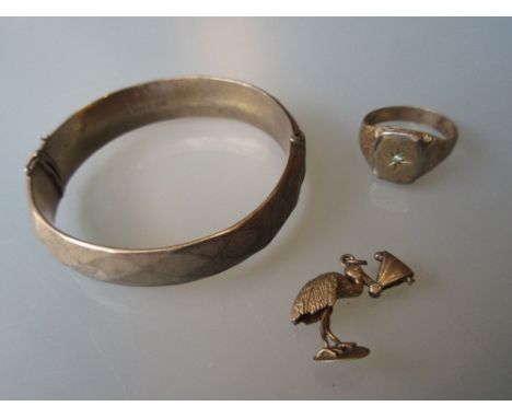 9ct Gold bangle, 9ct gold signet ring and a 9ct gold charm 