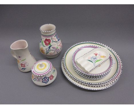 Collection of Poole pottery with floral decoration to include:-  6in baluster form vase, preserve pot, jug and plates 