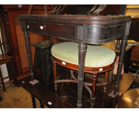 19th Century mahogany D-shaped fold-over tea table, the reeded top above a single frieze drawer raised on ring turned taperin