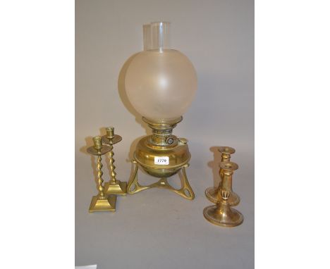 Brass oil lamp together with two pairs of brass candlesticks 