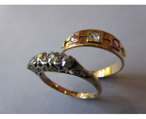 15ct Gold three stone diamond and ruby ring together with an 18ct gold four stone diamond ring (minus one stone) 