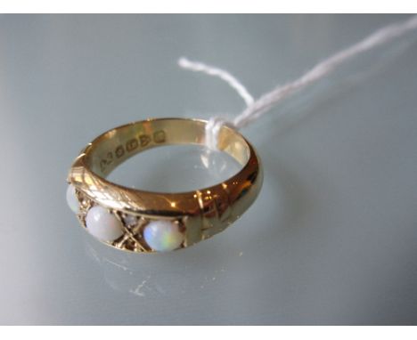 18ct Yellow gold ring set three opals 