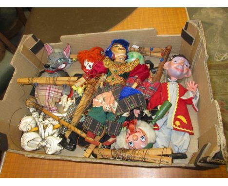 Box containing seven various Pelham puppets, unboxed and an Asian puppet 