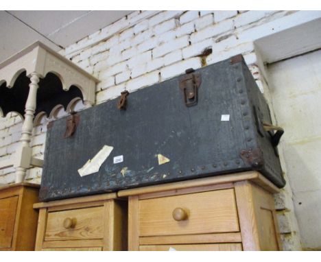20th Century black painted pine trunk with hinged cover having stencilled name for M.T. Seckel 