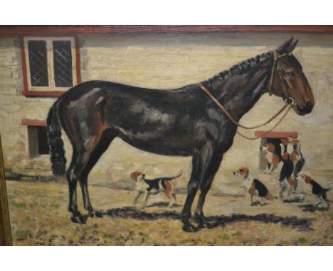 R. Bunting, oil on board, study of a horse and hounds in a stable, dated 1935, signed, in a gilt frame decorated with horsesh
