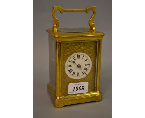 20th Century gilt brass carriage clock having replacement dial with Roman numerals and two train movement striking on a gong,