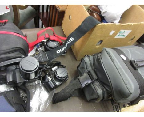 Praktica 35mm camera together with a quantity of other photography and video equipment 