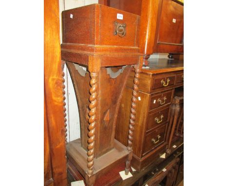 Arts and Crafts oak jardiniere stand having coppered ring handles and barley twist turned supports, 14ins square, 41ins high 