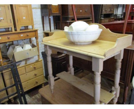 19th Century stripped and polished pine washstand together with a three piece pottery jug and basin set 