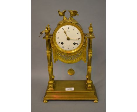 French Second Empire period ormolu mantel clock, the white enamel dial with Arabic and Roman numerals, signed Remacle a Aix-L