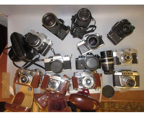 Praktica 35mm camera with two lenses, Rolleiflex 35mm camera and ten other various 35mm cameras 