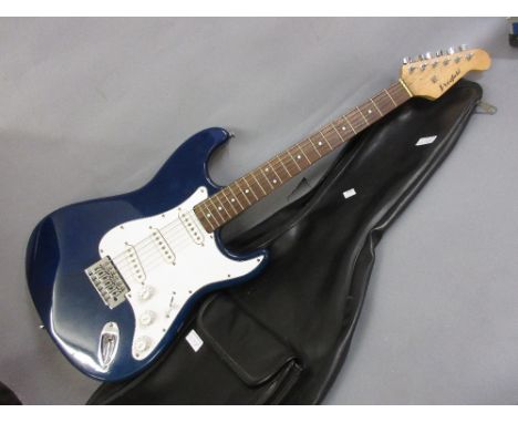 Westfield Stratocaster type three pick up electric guitar finished in transparent blue in a soft case (tremolo arm lacking) 