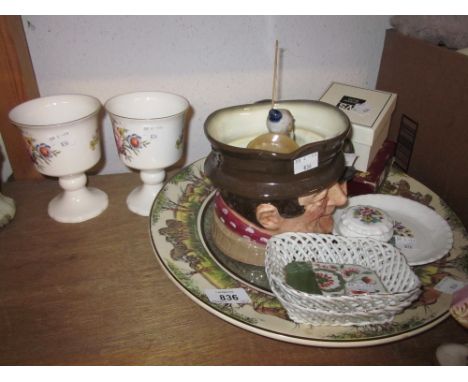 Royal Doulton African Series charger, D6365, African elephants, together with a large Doulton Toby jug, Sam Weller and a medi