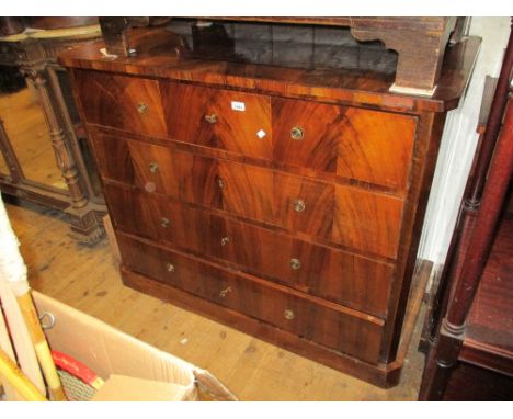 19th Century Continental walnut commode having four drawers with brass circular ring handles on a plinth base, 38.5ins high x