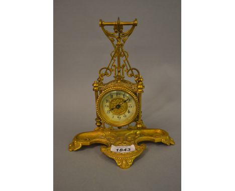 Small 19th Century French ormolu clock mounted on an ormolu standChapter ring has several hairline cracks, otherwise in good 