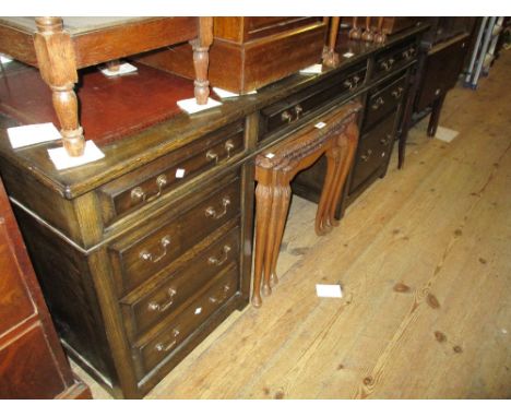 Reproduction oak twin pedestal desk with a red tooled leather inset top above drawers, together with a matching filing cabine