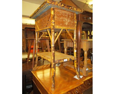 19th Century bamboo side table having hinged cover and undertier, together with a near matching bamboo jardiniere stand with 