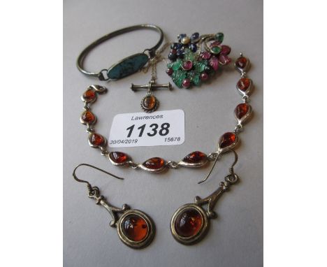 Indian silver and gem stone set floral brooch, silver and turquoise bangle and a suite of silver and Baltic amber jewellery i