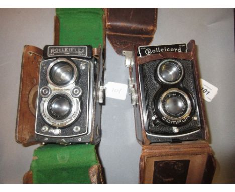 Rolleicord twin lens camera with original leather case together with another similar 