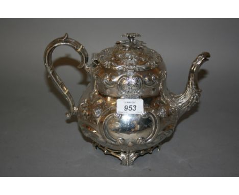 Victorian floral embossed silver teapot, Sheffield, 1857, makers mark R. & S.Spout slightly dented, a few minor dents to the 