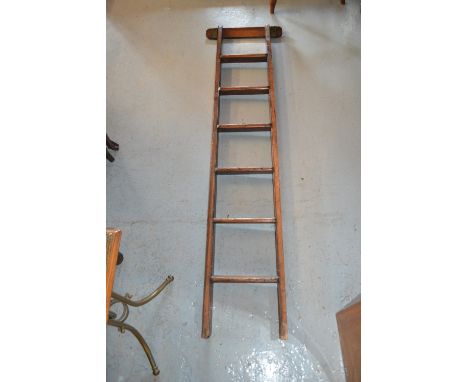19th Century stained pine six step library ladder with leather mounted restThere is wear to the lower rungs of the ladder how
