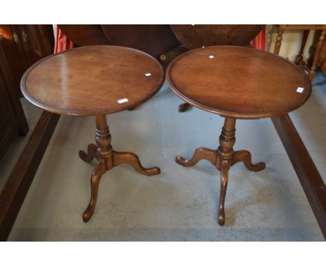 Pair of Trevor Lawrence oak circular dish top pedestal lamp tables, with turned tapering column and cabriole pad supports in 