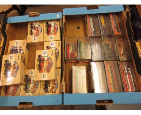 Two boxes containing a collection of Corgi boxed buses and coaches etc. 