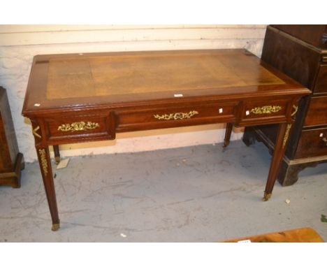 Good quality 19th Century French mahogany writing desk having tan gilt tooled leather inset top with opposing pull-out slides