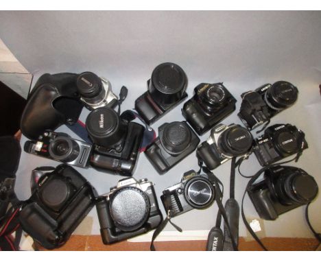 Canon EOS1 electronic SLR camera, a Canon EOS 50E, Nikon F90X and a quantity of other electronic 35mm SLR camerasVarious dama
