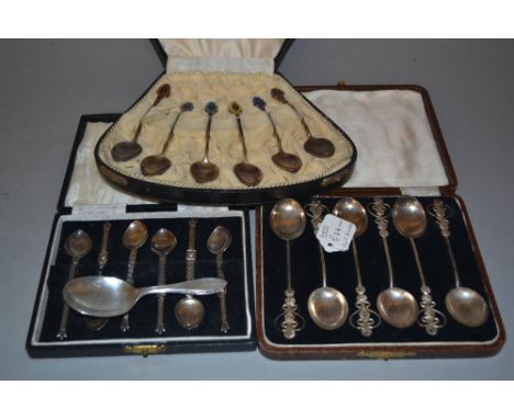 Cased set of six Norwegian silver enamel decorated coffee spoons together with a cased set of English silver coffee spoons an