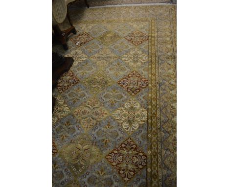 Indian Persian pattern woollen carpet of all-over floral design with multiple borders on a blue ground, approximately 11ft 1i