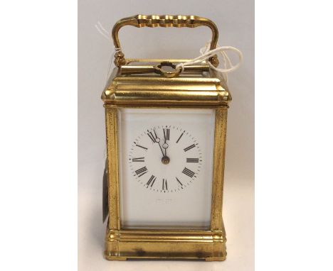 A French brass and glass carriage clock, the movement numbered 11338 Condition Report: has key but doesn 't wind. Chipped to 