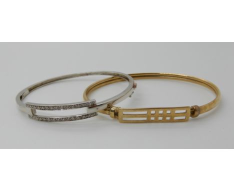 A 9ct white gold diamond set bangle together with a 9ct yellow gold example, combined weight 13.8gms Condition Report: Availa