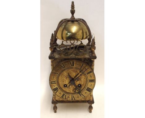 A brass cased lantern clock, the movement marked 37630 Condition Report: has key, winds slightly, not apparently working thou