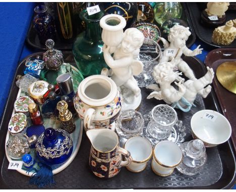 Assorted scent bottles, cherub candlestick and other items Condition Report: Available upon request
