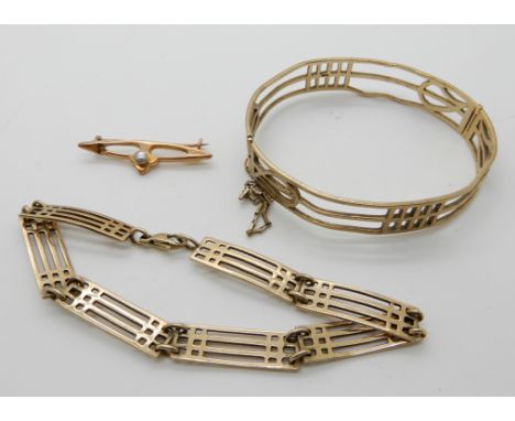 A 9ct gold Mackintosh style bangle with similar bracelet and a yellow metal pearl set brooch, combined weight 24.8gms Conditi
