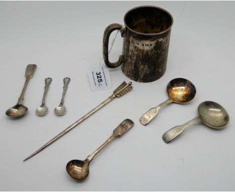 A lot comprising a silver christening mug Birmingham 1904, 8.5cm in height, a silver mustard spoon, a white metal mustard spo