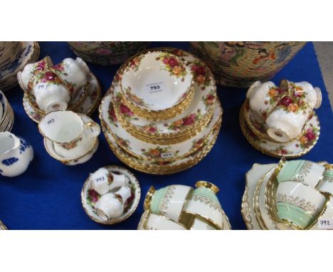 A Royal Albert Old Country Roses dinner service comprising six dinner plates, soup bowls, pudding bowls, cups, saucers, cake 