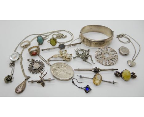 A wide silver bangle, marcasite spider brooch, Ortak brooch and other itemsCondition Report: Not available for this lot.