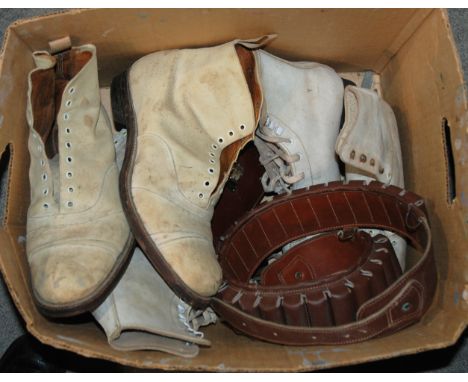 A box of various including ammunition belt, soft gun case, ice skating boots etc Condition Report: Available upon request