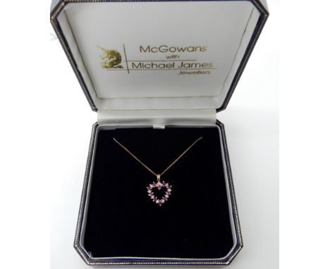 A 9ct gold ruby and diamond heart pendant, dimensions approx 19mm x 14.6mm, length of chain 43cm, weight 1.9gms Condition Rep