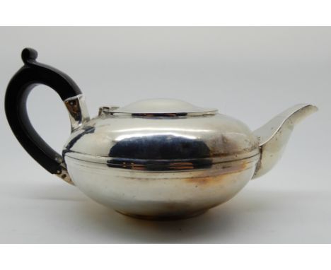 A silver tea pot, London 1826 of Squat circular form, missing cover finial, 13cm diameter, 340gms Condition Report: Available