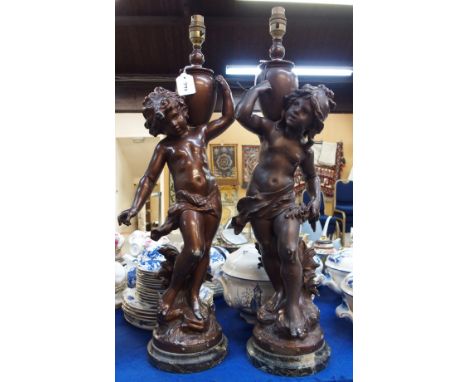 A pair of bronzed spelter figural table lamps  Condition Report: should say bronzed spelter. To top of light fitment 66.5cm h