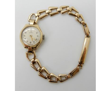 A 9ct gold ladies Omega wristwatch, strap length 17.5cm, weight including mechanism 16.4gms Condition Report: Winds and is ti