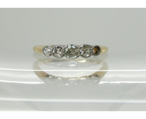 An 18ct gold five stone diamond ring (one diamond missing) estimated approximate diamond weight as it is now 0.25cts, size K,