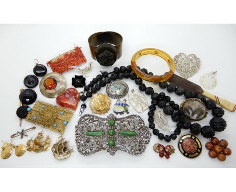 Jet beads, an Yves St Laurent heart brooch, a carved lucite bangle and other itemsCondition Report: Not available for this lo